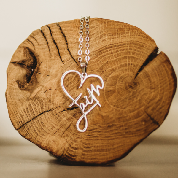 Faith Heart Necklace on Log