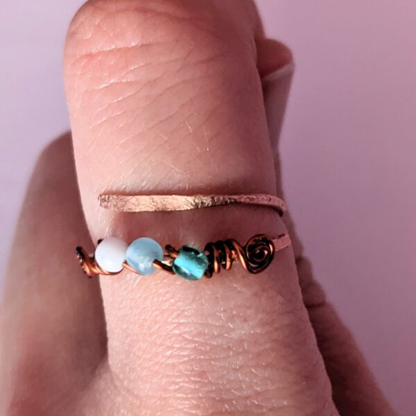Solid Copper Ring with wire wrapped beads and hammered texture on model