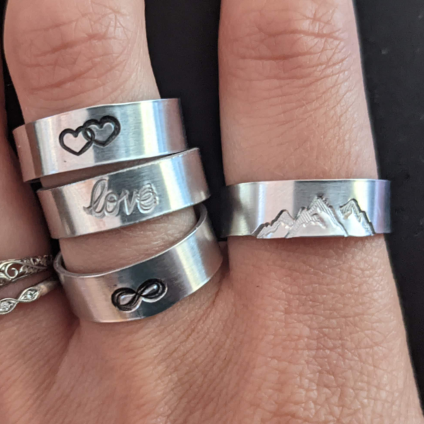 Custom Stamped Rings on Model